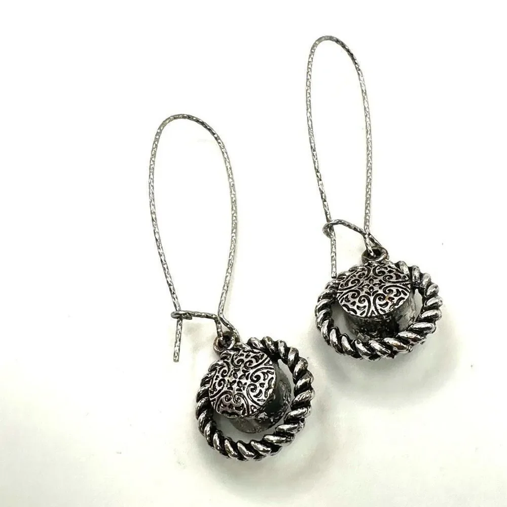 Silver tone green crystal dangling earrings